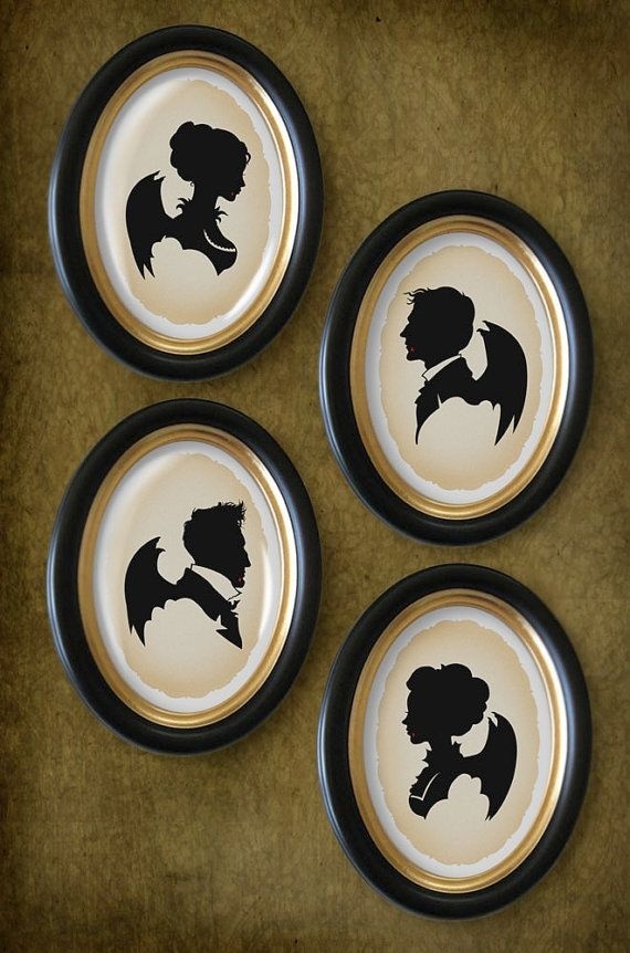 Framed vampire silhouettes for a black and white Halloween decoration. 