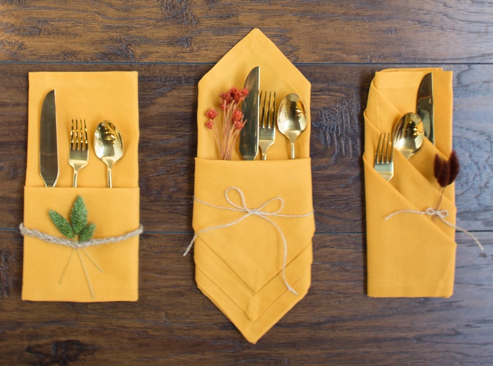 how to fold napkins for a fall table or thanksgiving table using yellow napkins